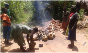 Figure 1: Community Members participate in making Energy Saving Stoves